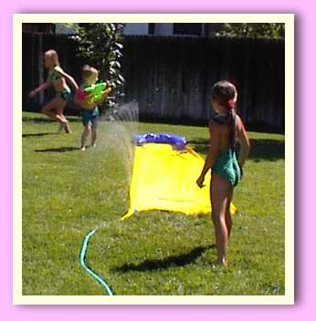 The kids on the slip 'n slide.